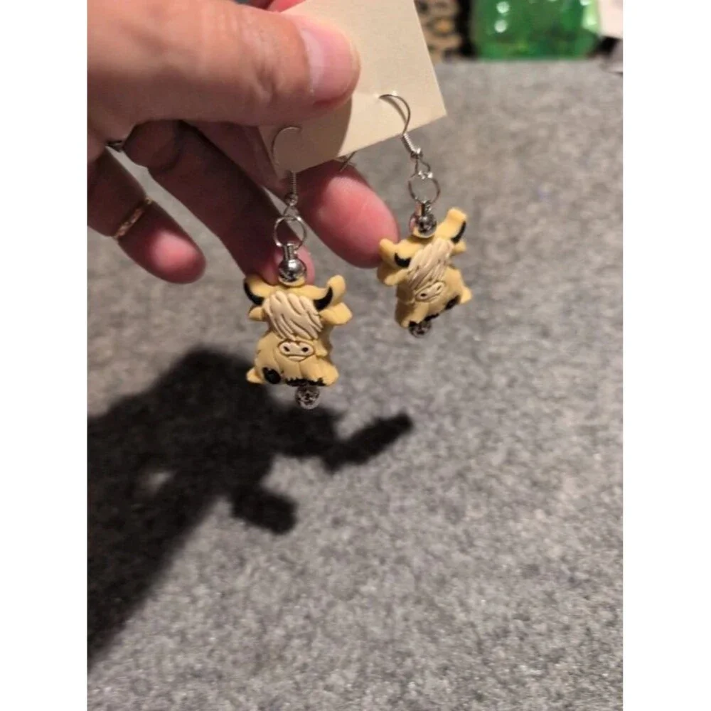 Highland cow dangle earrings. Nickle free hooks